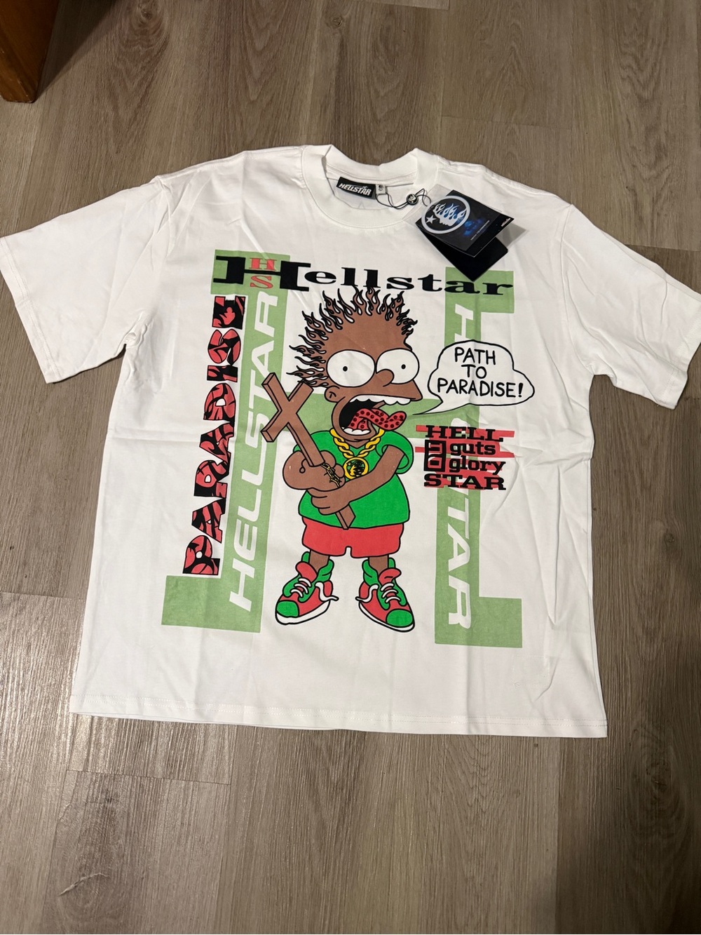 Hellstar Black Bart SimpsonWhite Graphic Tee with Green & Red Cartoon Print